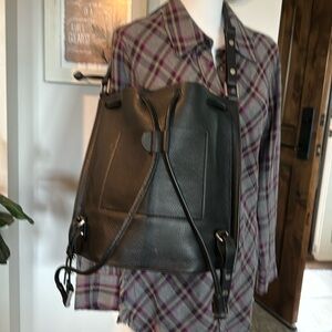 All Saints Alpha Medium Backpack/Bucket bag. Leather in black.